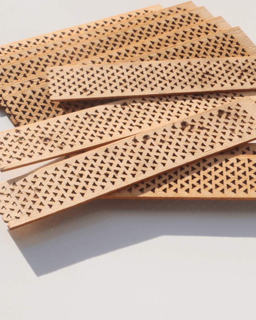 Perforated model wooden candle wick with clips - LuxyM Candle Supplier