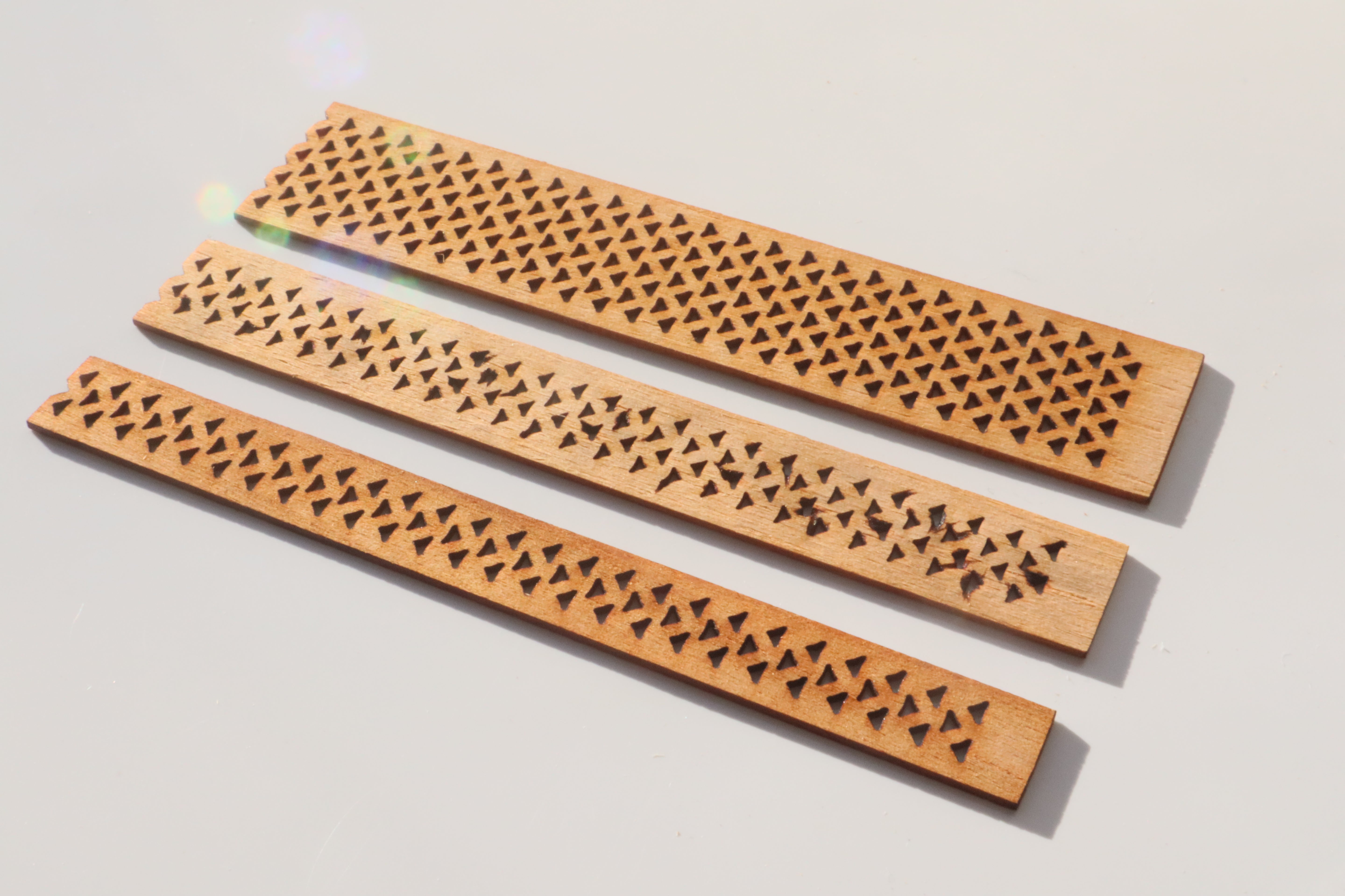 Perforated model wooden candle wick with clips - LuxyM Candle Supplier