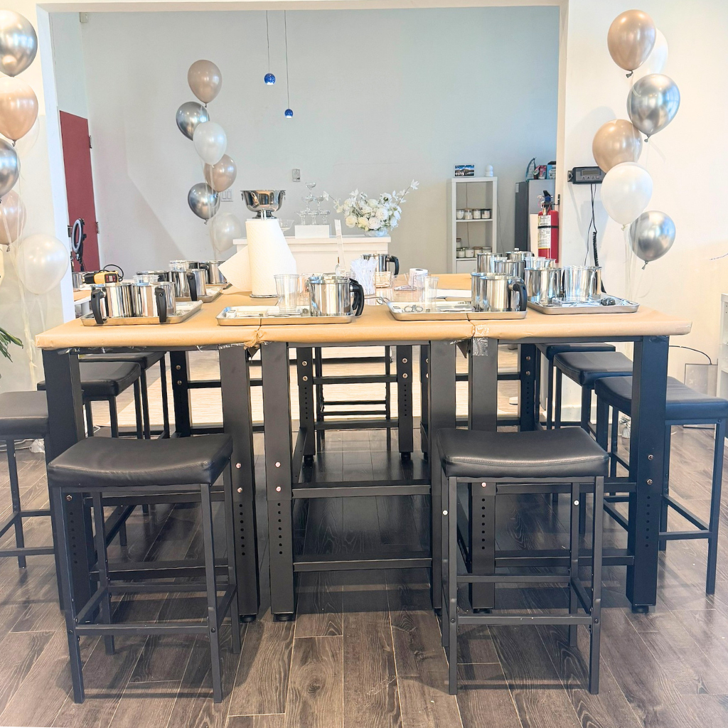 Group candle making event experience at LuxyM Studio Toronto with decorated setup